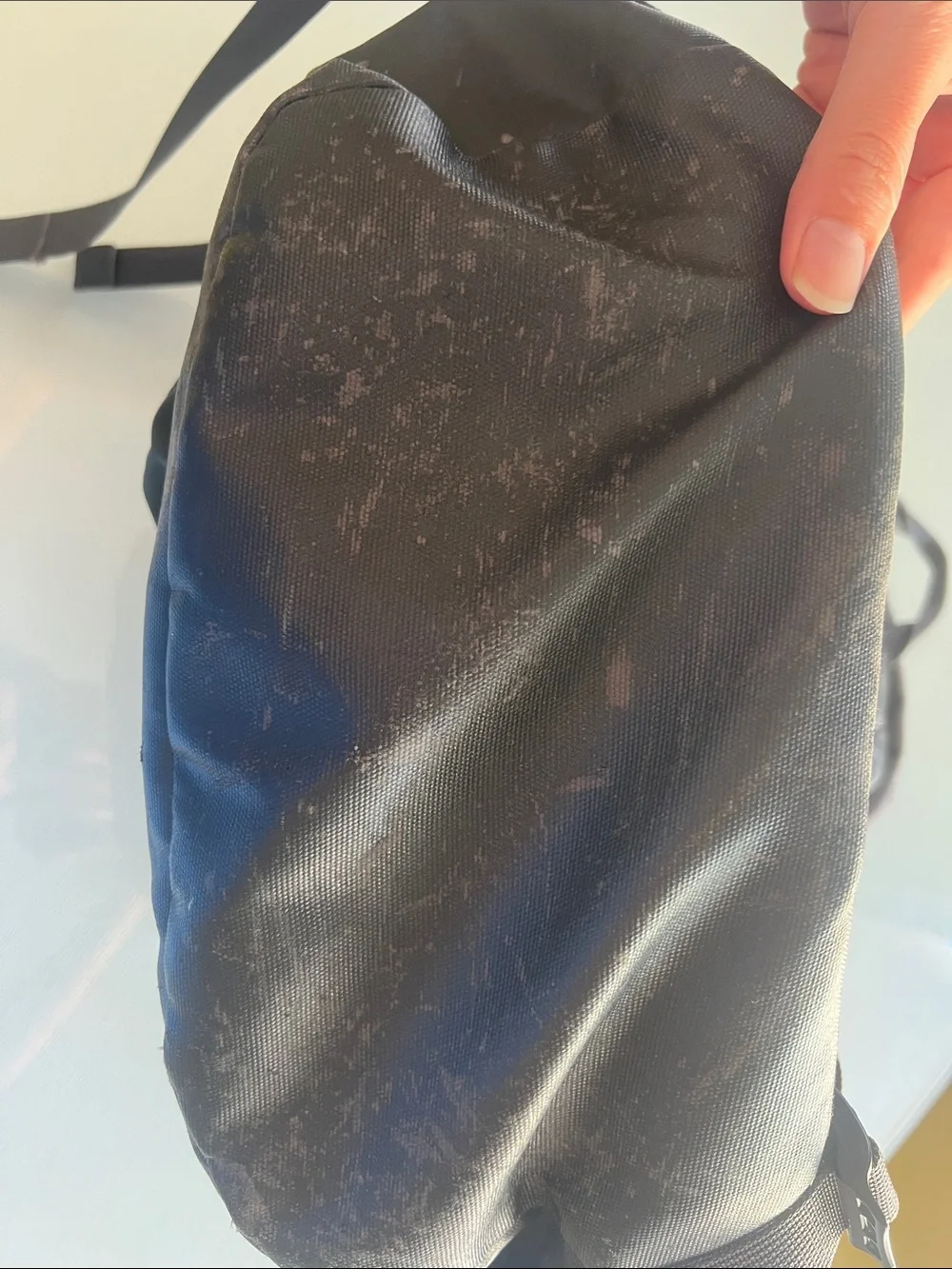 The North Face Gray Backpack with Red Logo and Black Base